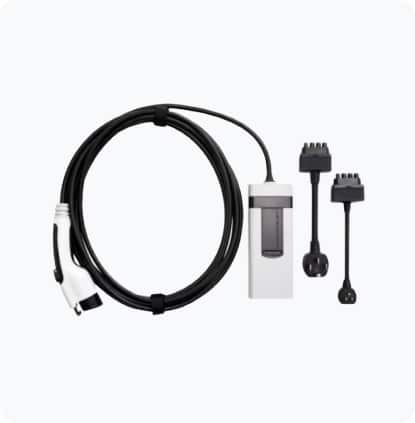 Electric vehicle charging cable and connectors with a white adapter, designed for efficient EV charging.