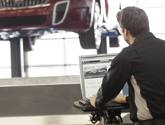 24/7 drop-off and pick-up kiosk for vehicle services, featuring a modern design and user-friendly interface, located against a blue background.